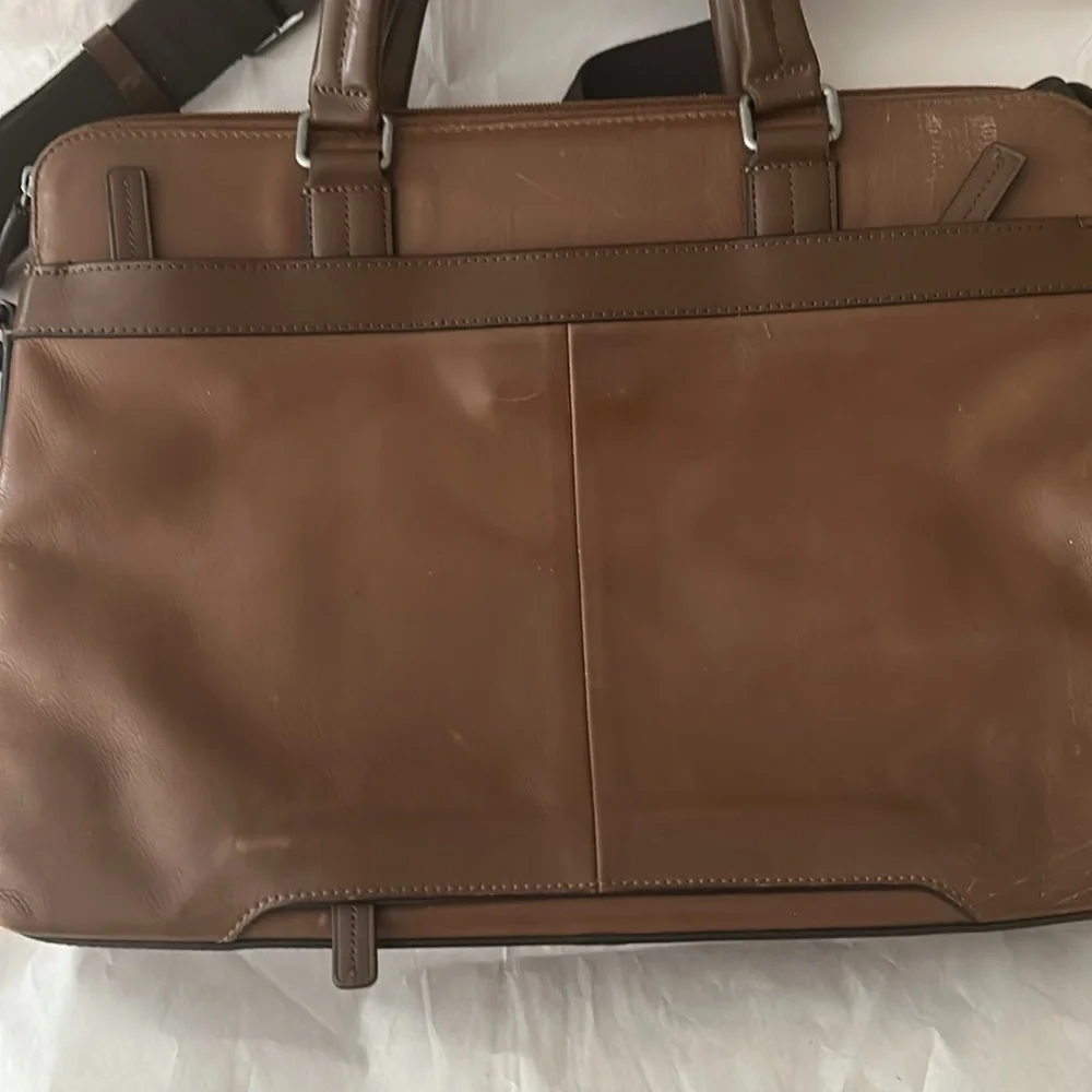 TUMI; Brown Leather Expandable Laptop Bag.